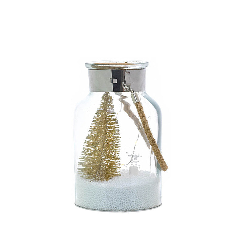 Botella de decoración navideña con nieve y árbol de navidad dorado