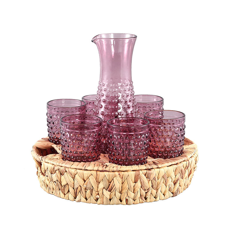 Juego de jarra y seis vasos de cristal color rosa y bandeja de mimbre