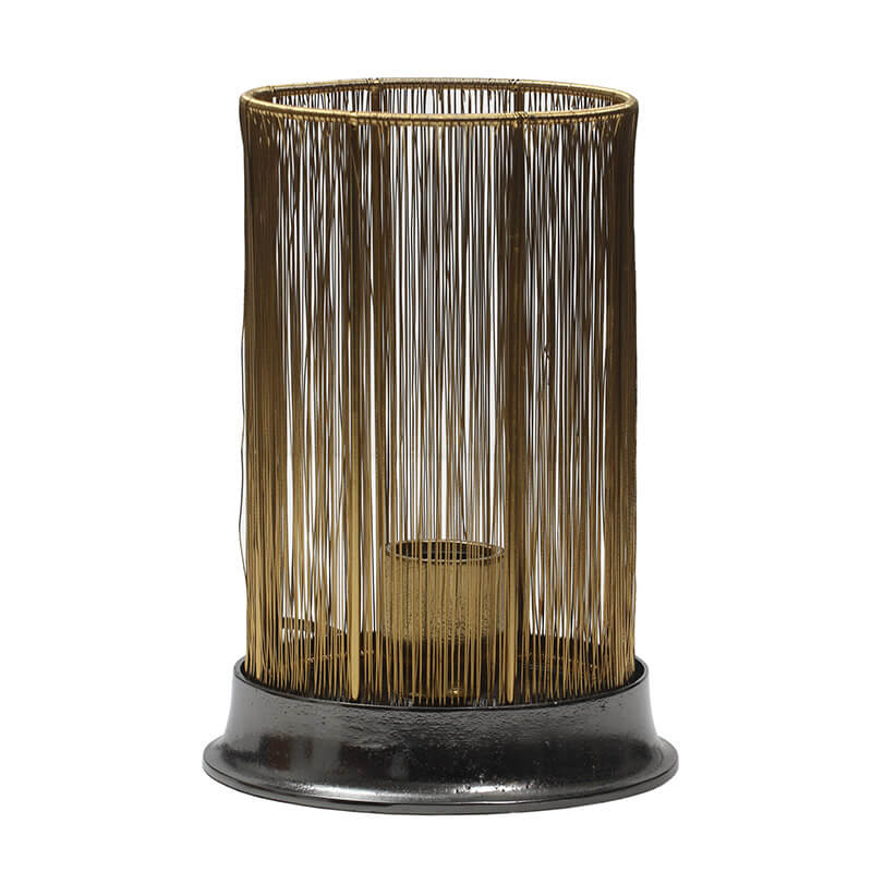 Lámpara de mesa de metal dorado con base negra brillante